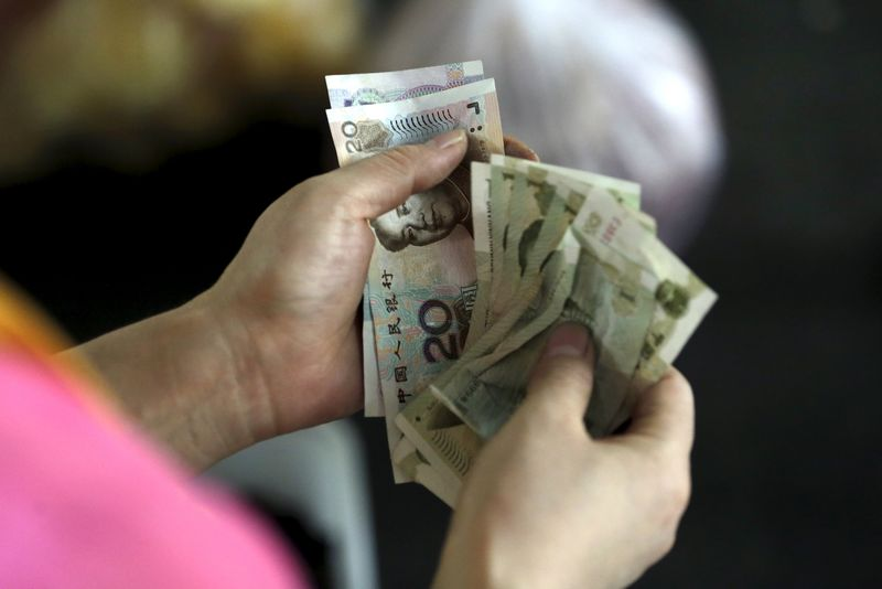 China deve permitir depreciação significativa do iuane com escalada da guerra comercial